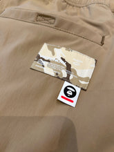 Load image into Gallery viewer, AAPE By *A Bathing Ape® Now Badge Woven Shorts in Tan - Bisy Clothing